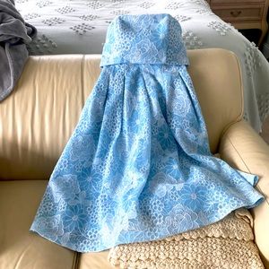 Asia strapless dress. White lace overlay with blue. Worn once.